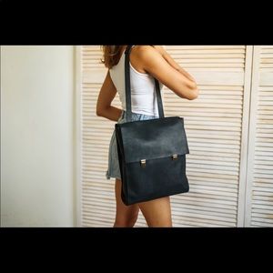 Unused Convertible black leather laptop backpack